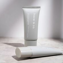 Load image into Gallery viewer, Hazel &amp; Co. Moisturizing Sunscreen SPF 50 UVA/UVB Protection 50g | With Niacinamide, Hyaluronic Acid, Hydrating, Brightening, Anti-Aging
