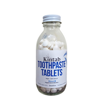 Load image into Gallery viewer, Kintab Toothtabs - 100% Natural Fluoridated Toothpaste Tablets | Sustainable, Travel-Friendly, Eco-Friendly Oral Care | Minty Fresh, TSA-Safe, Refillable Packaging
