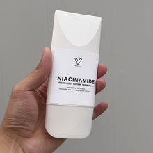 Load image into Gallery viewer, Vegan Essentials Niacinamide Everyday Vegan Lightening Body Lotion with SPF50 PA+++ Broad Spectrum for Instant Glow and Sun Protection with Kojic Acid 100ml (FKA Crystal Glow)
