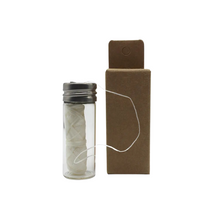Load image into Gallery viewer, Plant-Based Dental Floss Made with Corn in Glass Container by Project Refill
