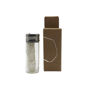 Plant-Based Dental Floss Made with Corn in Glass Container by Project Refill